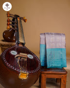 Grey & Sky Blue Tissue Silk Saree with Box Peacock Design and 2G Silver Zari Korvai Border