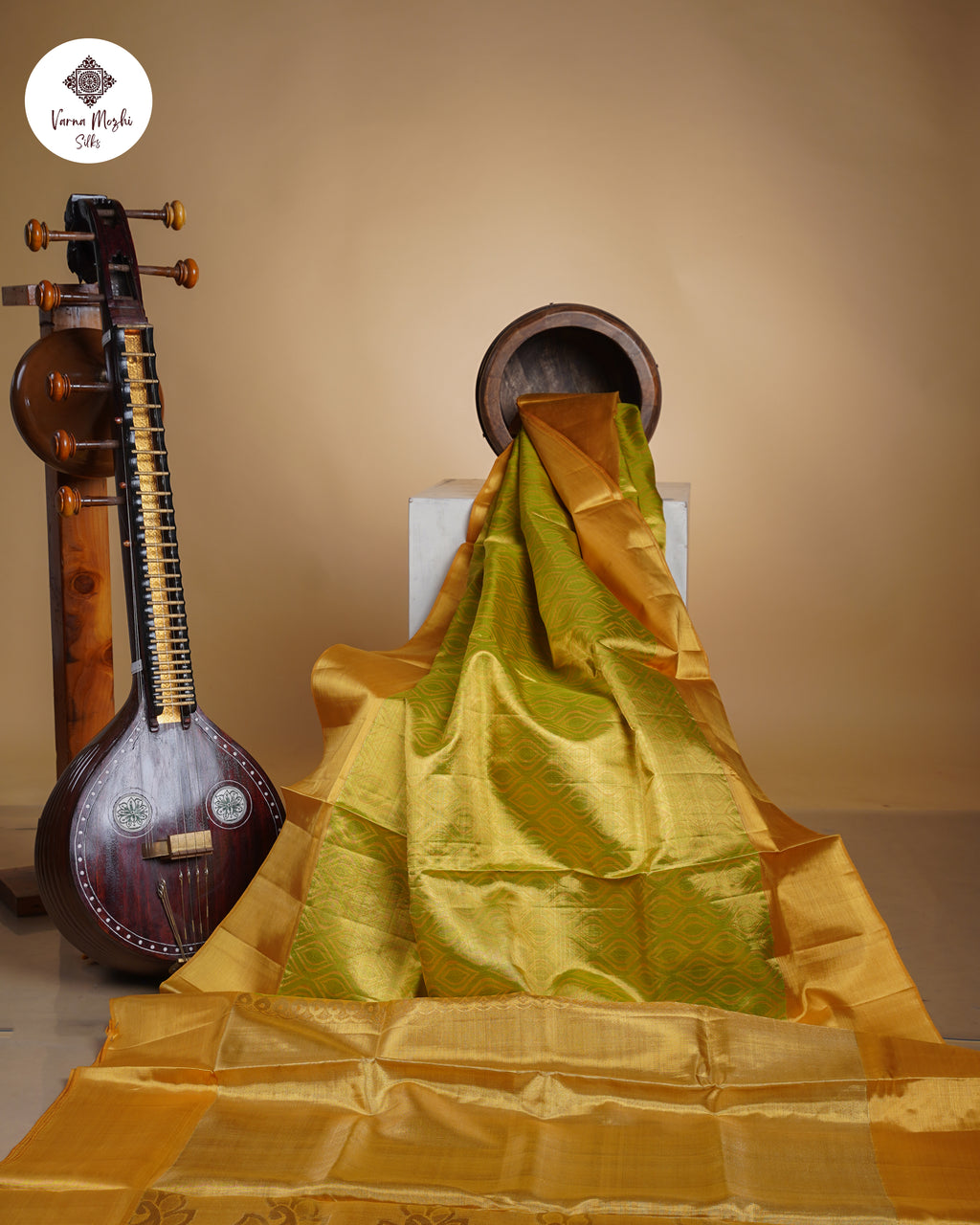 Leaf Green Pure Zari Tissue Silk Saree – Diamond Weave Design & Gold Border