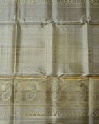 Leaf Green Pure Zari Tissue Silk Saree – Diamond Weave Design & Gold Border