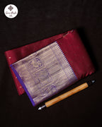 Maroon Pure Silk Saree with Violet Contrast Border and Butta Design