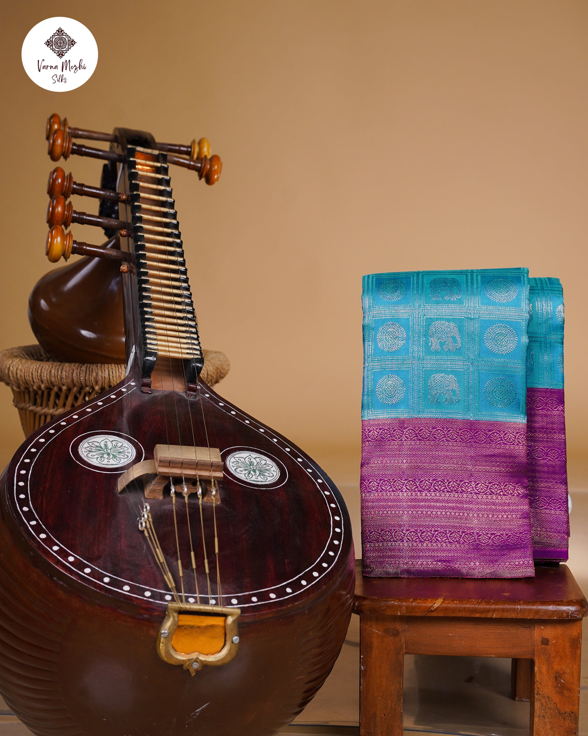 Ramar Blue Tissue Silk Saree with Purple Border & Yaanai Chakkaram Silver Zari