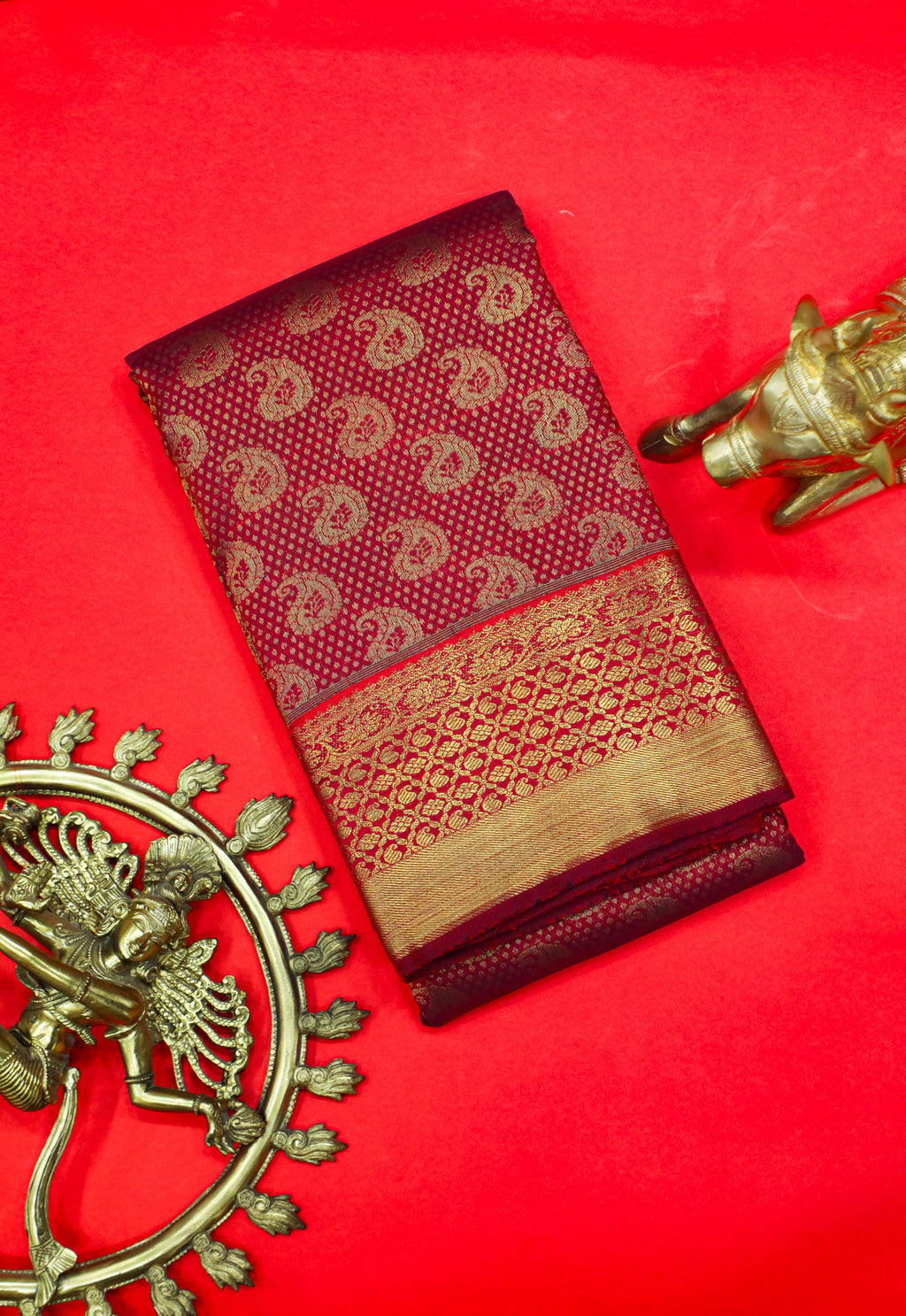 Maroon Kanchipuram Pure Silk Saree with Traditional Self Border and Manga Butta Design