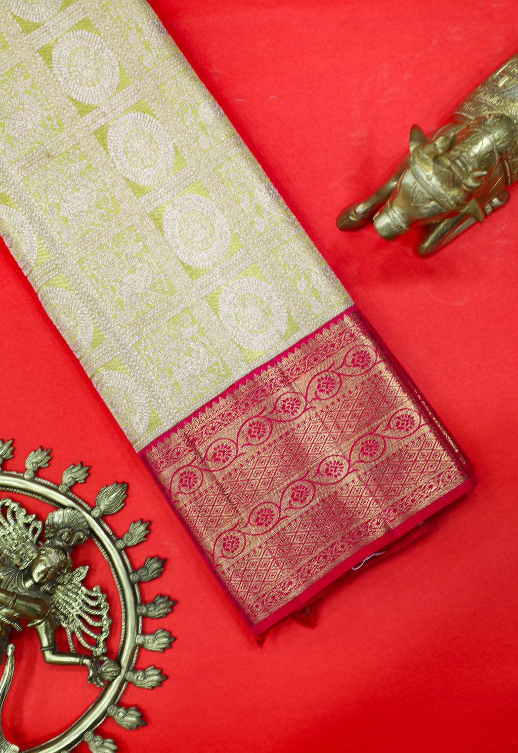 Pista Green Kanchipuram Pure Silk Saree with Tomato Red Korvai Border and Deer Chakra Design