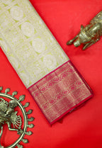 Pista Green Kanchipuram Pure Silk Saree with Tomato Red Korvai Border and Deer Chakra Design