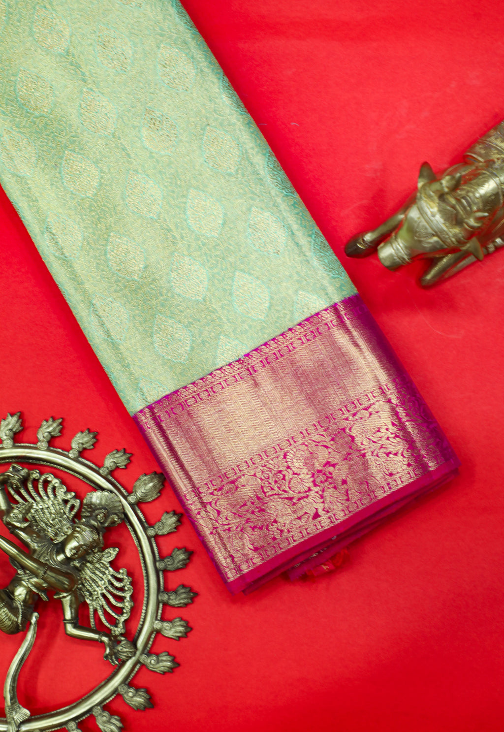 Pista Green Kanchipuram Pure Silk Saree with Tomato Red Korvai Border and Kodi Thilagam Design