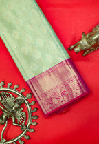 Pista Green Kanchipuram Pure Silk Saree with Tomato Red Korvai Border and Kodi Thilagam Design