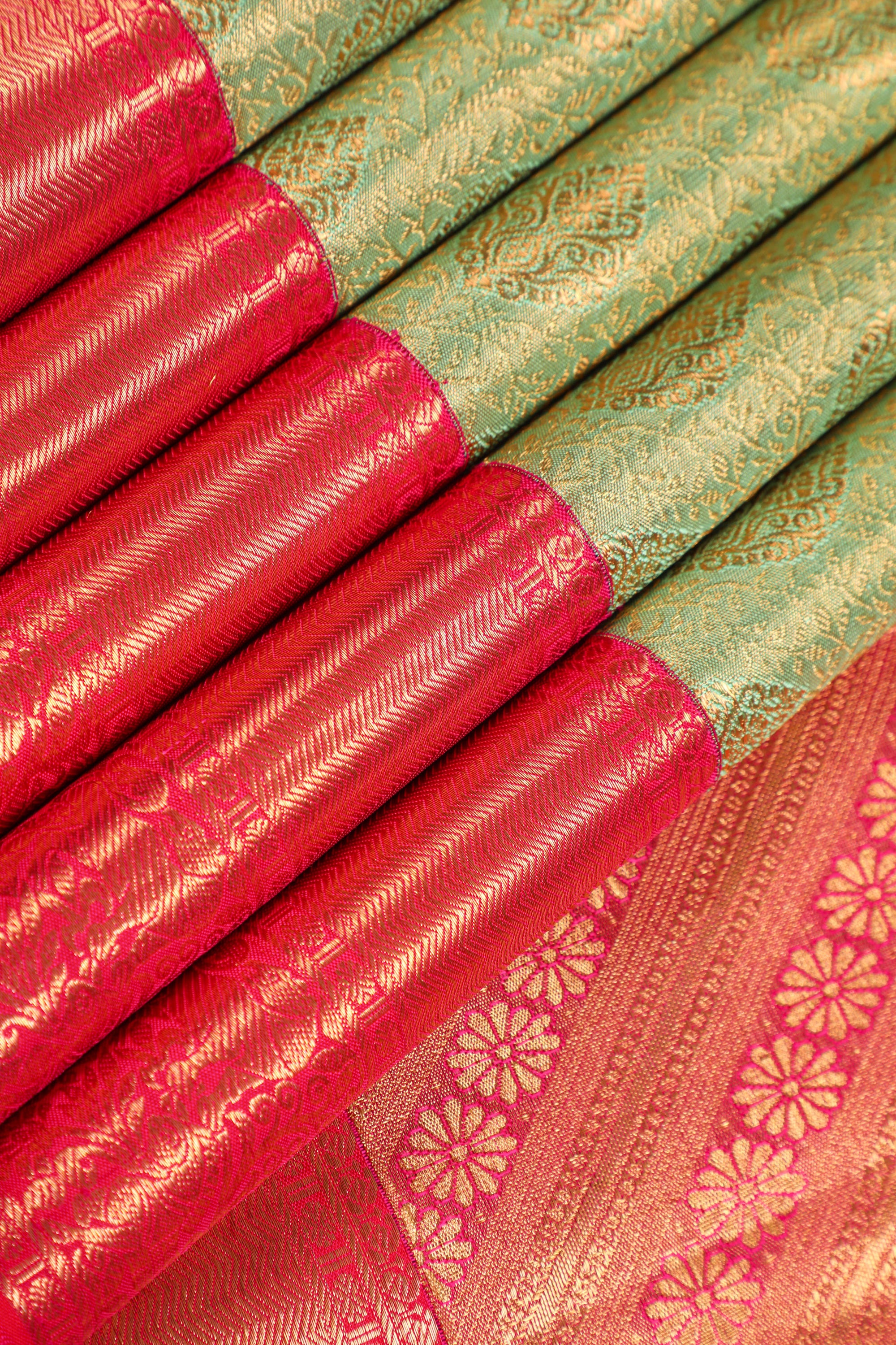 Pista Green Kanchipuram Pure Silk Saree with Tomato Red Korvai Border and Kodi Thilagam Design