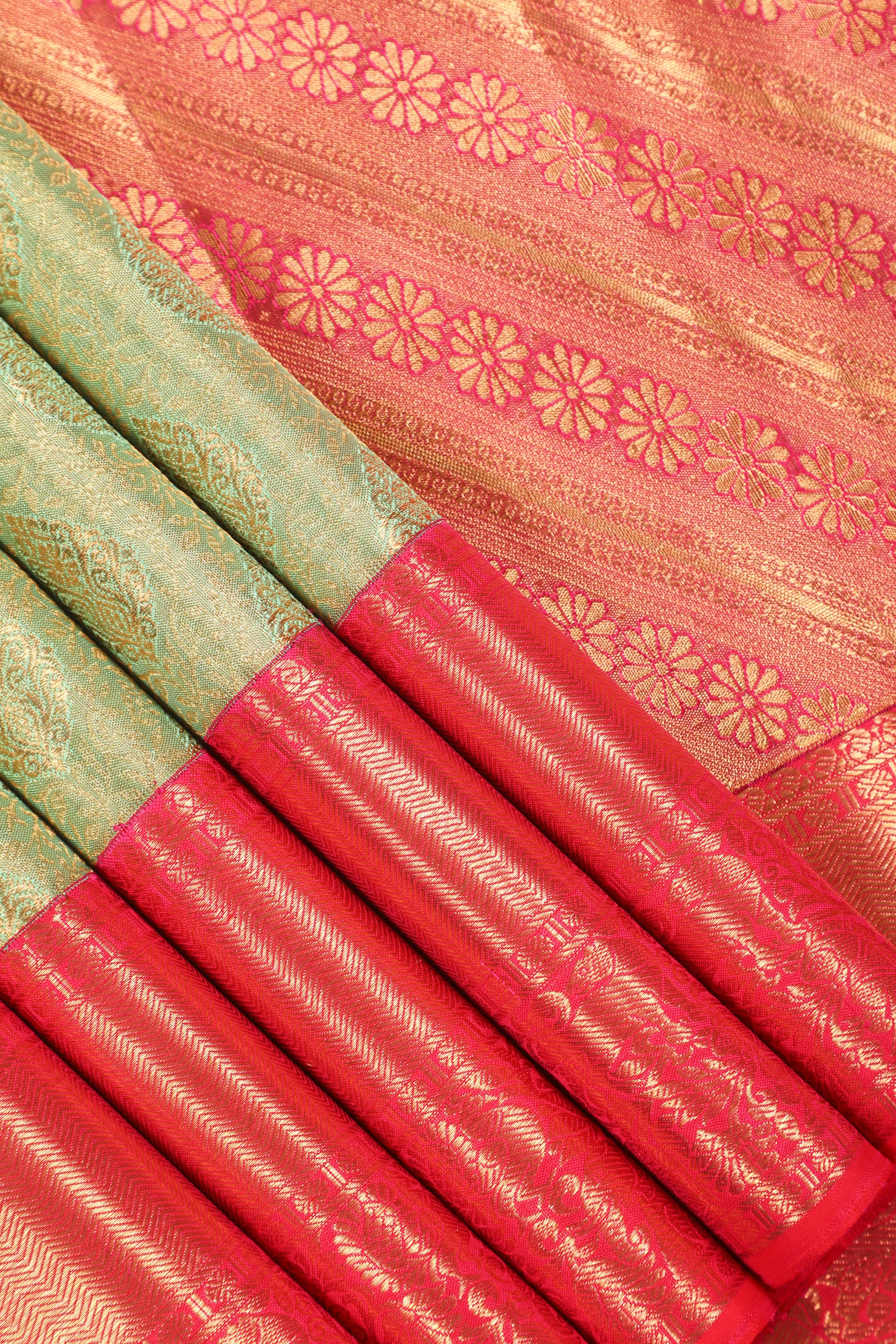 Pista Green Kanchipuram Pure Silk Saree with Tomato Red Korvai Border and Kodi Thilagam Design