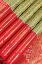 Pista Green Kanchipuram Pure Silk Saree with Tomato Red Korvai Border and Kodi Thilagam Design