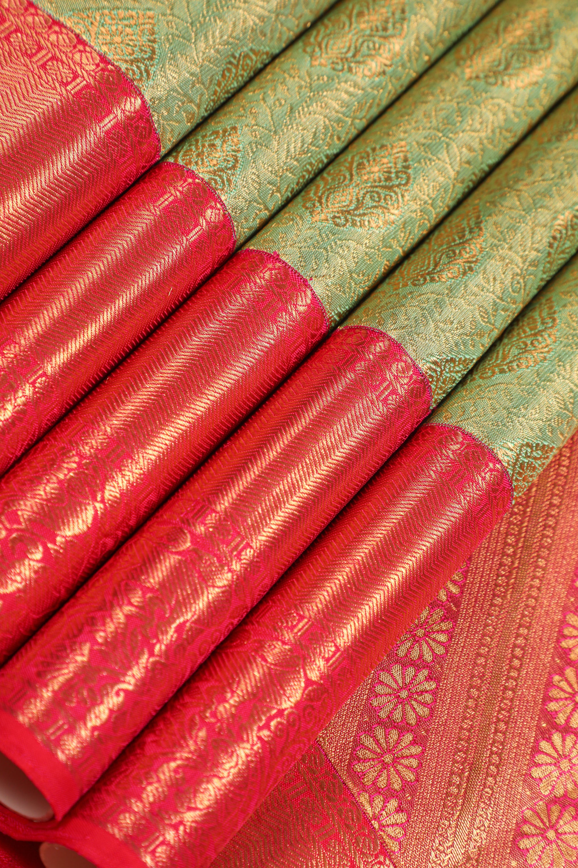 Pista Green Kanchipuram Pure Silk Saree with Tomato Red Korvai Border and Kodi Thilagam Design