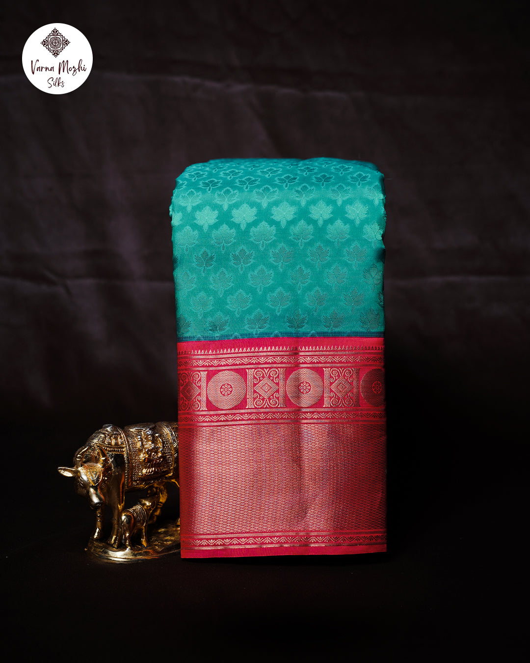 Rexona Green Pure Silk Saree with Red Korvai Border